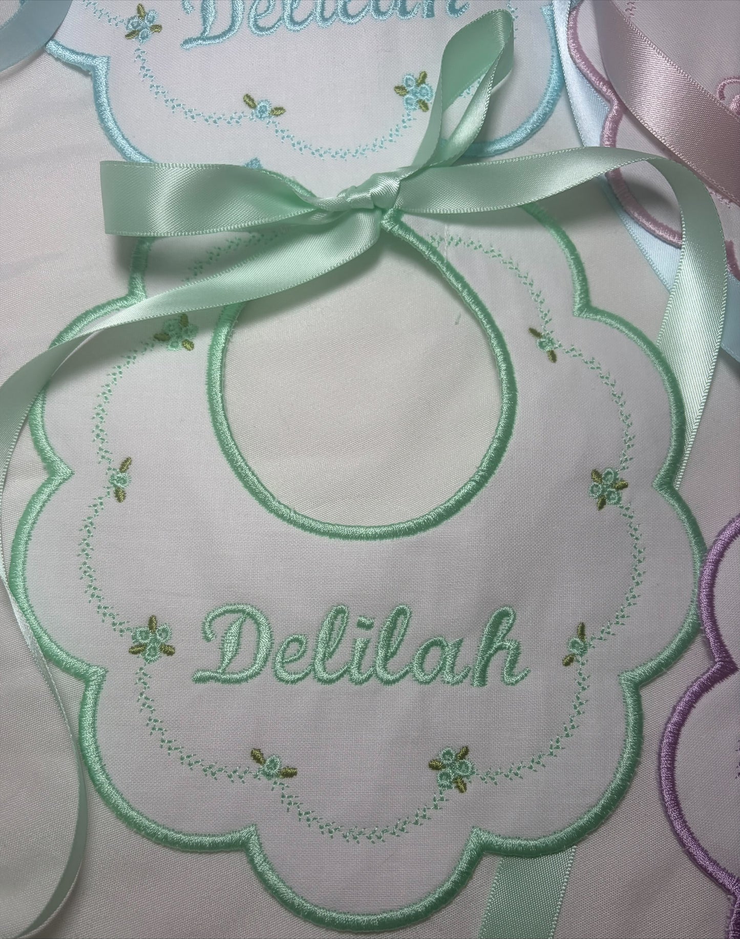 Rose Scalloped Bib with ribbon